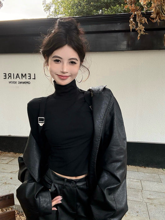 NA+ 酷颯美模揹帶設計感高領長袖上衣 黑