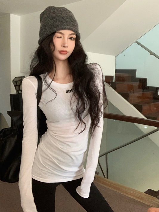 NA+ 柔軟雪花棉圓領打底微透視白色上衣