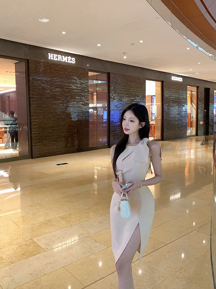 NA+ 溫柔名媛不規則剪裁綁帶連身裙 粉杏色