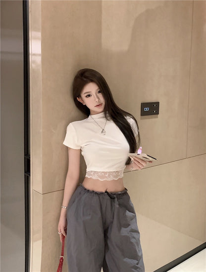 Na+ 嬌欲私藏甜美蕾絲衣擺上衣 白