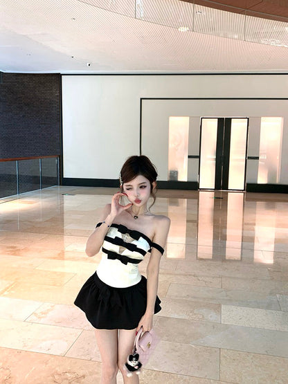 NA+ 黑白撞色女爵一字領蝴蝶結條紋上衣