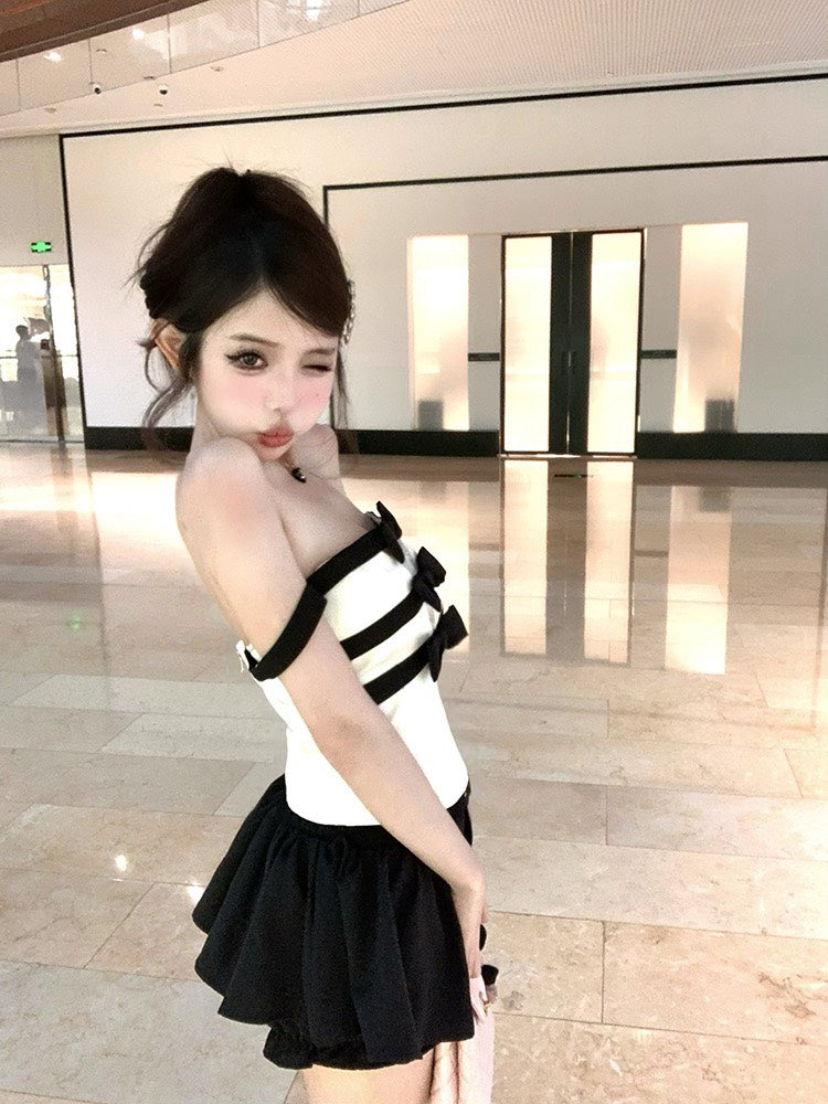 NA+ 黑白撞色女爵一字領蝴蝶結條紋上衣