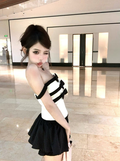 NA+ 黑白撞色女爵一字領蝴蝶結條紋上衣