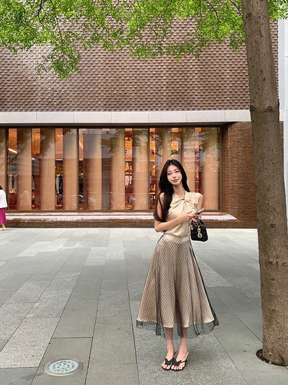 NA+ 黑閃耀人魚紗雙層半身裙 金色扭結上衣