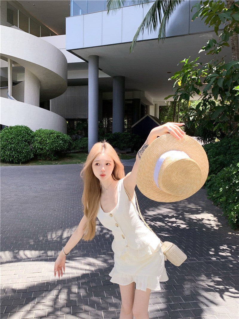 Na+ 荷葉圓舞曲 肌理鈕扣收腰馬甲 花苞半身裙 米