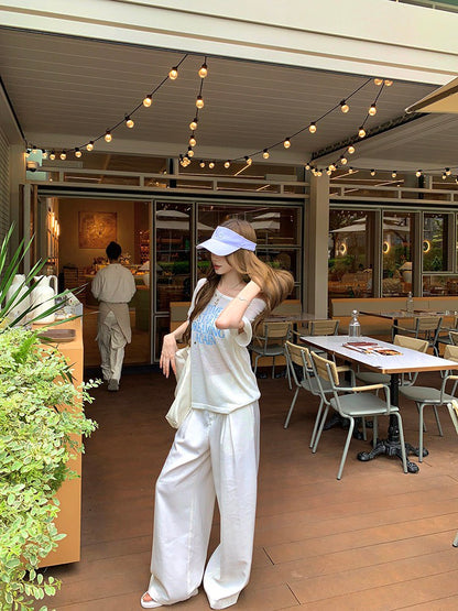 NA+ 百搭休閒斜肩透視字母上衣