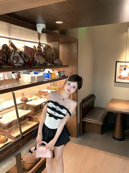 NA+ 黑白撞色女爵一字領蝴蝶結條紋上衣