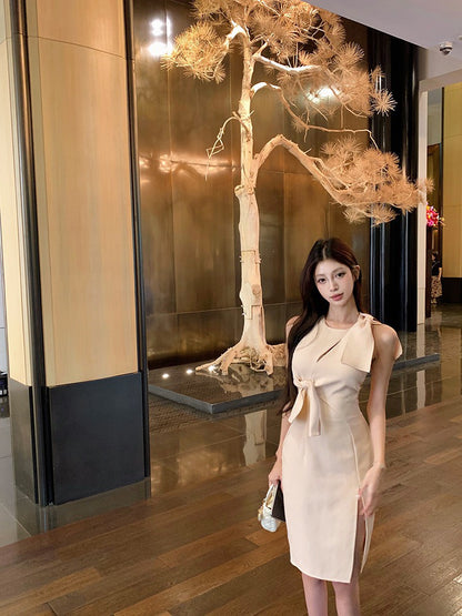 NA+ 溫柔名媛不規則剪裁綁帶連身裙 粉杏色