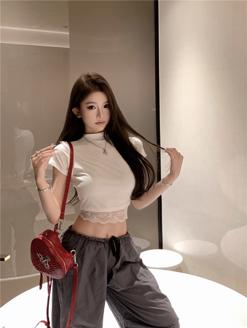 Na+ 嬌欲私藏甜美蕾絲衣擺上衣 白