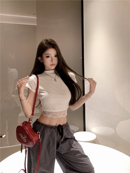 Na+ 嬌欲私藏甜美蕾絲衣擺上衣 白