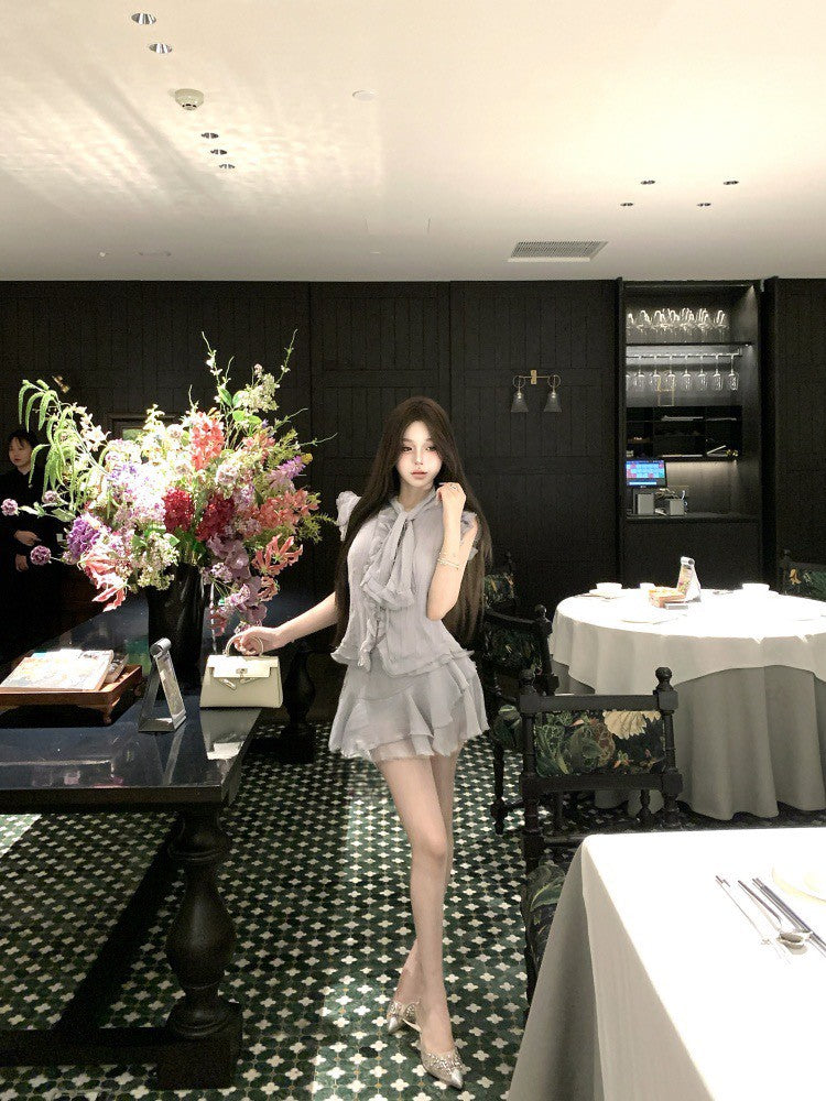 NA+ 南洋千金雪紡飄逸荷葉上衣 不規則半身裙 藍灰