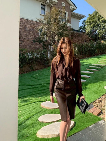 NA+ 野性美 通勤透紗飄帶襯衫/前開衩高腰半身裙 咖