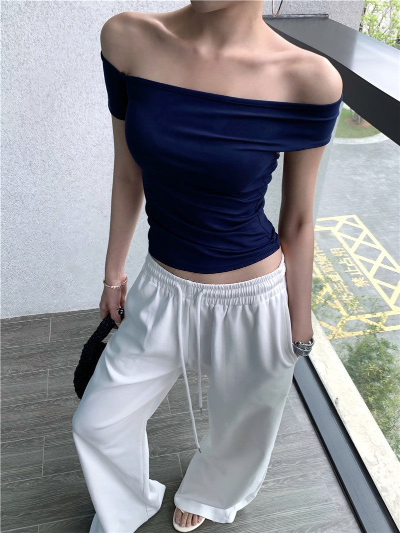 Na+ 歐美辣妹不規則一字露背彈力上衣 藍