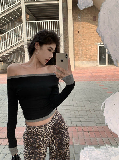 ''Na+''不分季節當辣妹 撞色包邊一字領彈力上衣 黑/深灰